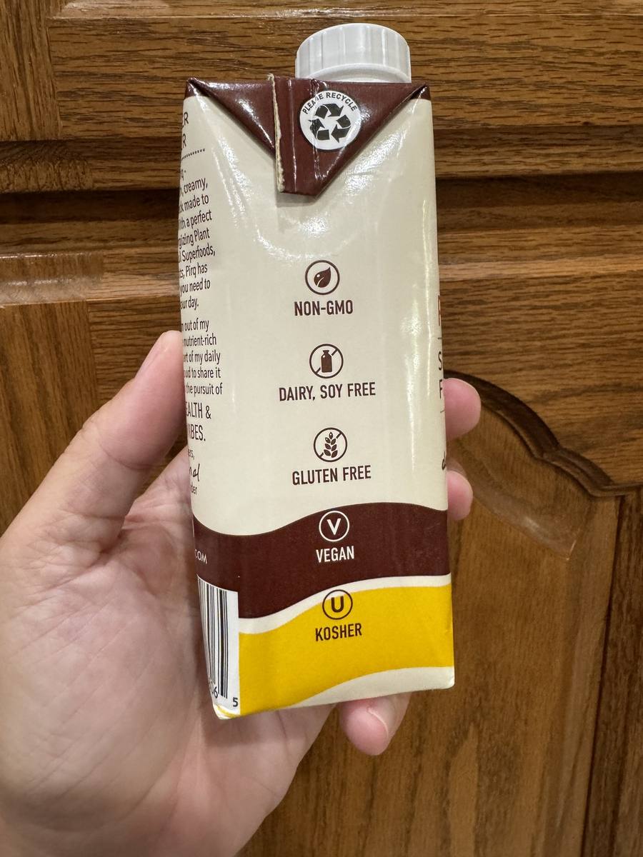 A carton showing non-GMO, dairy and soy free, gluten free, vegan and kosher symbols in a vertical row.