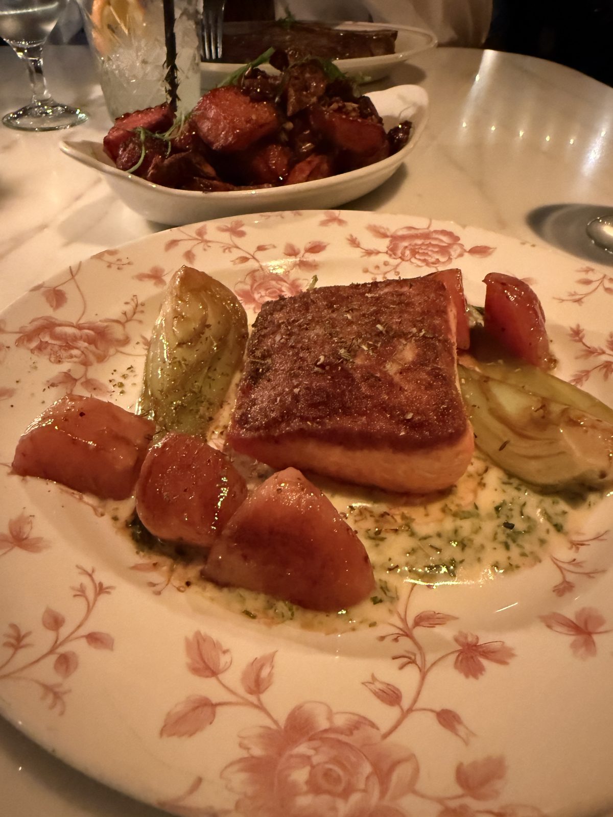 Gluten free crisp-skinned salmon with braised fennel and blistered tomatoes at Le Ame at The Global Ambassador in Phoenix