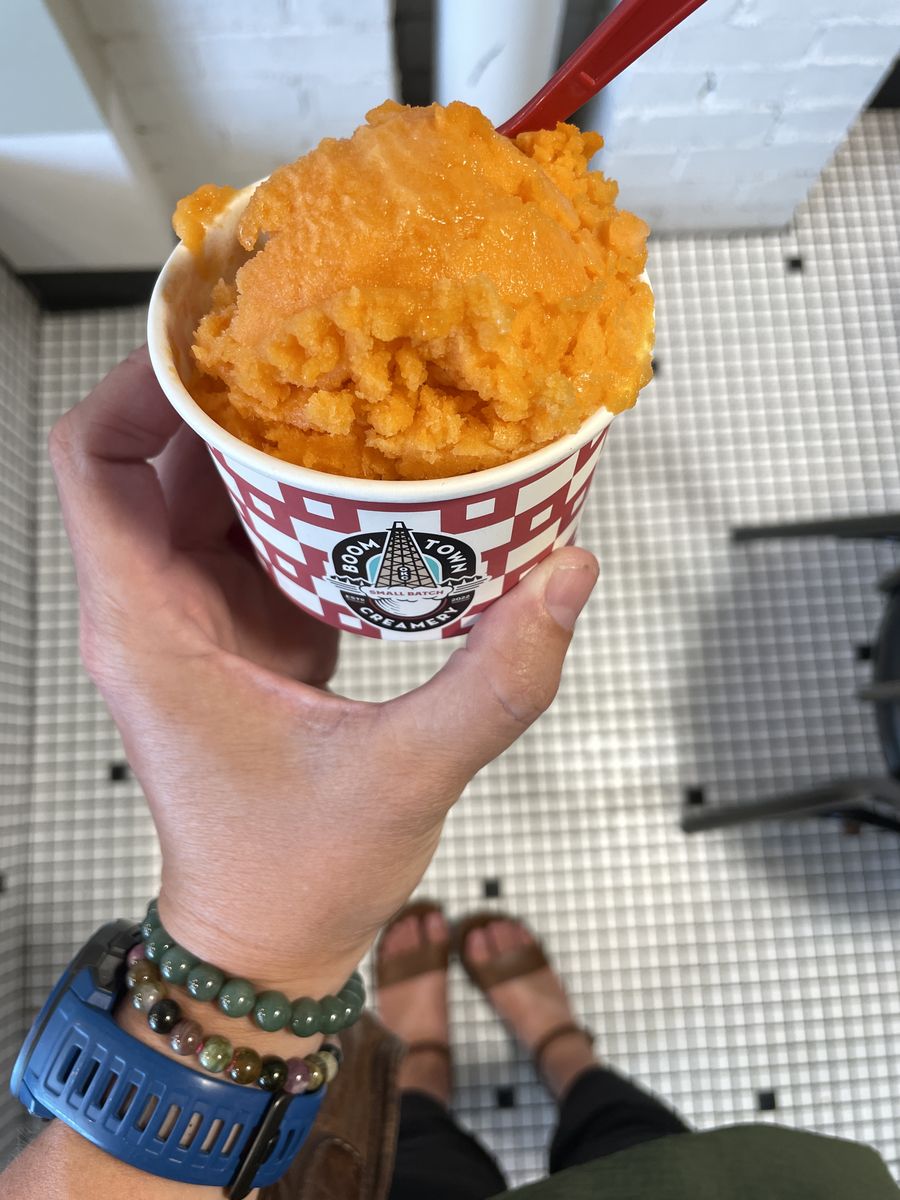 A cup of bright orange carrot and orange sorbet from Boom Town Creamery in Oklahoma City.