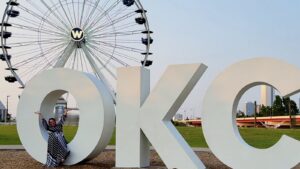 The giant OKC letters in front of the Wheeler Ferris Wheel in Oklahoma City.